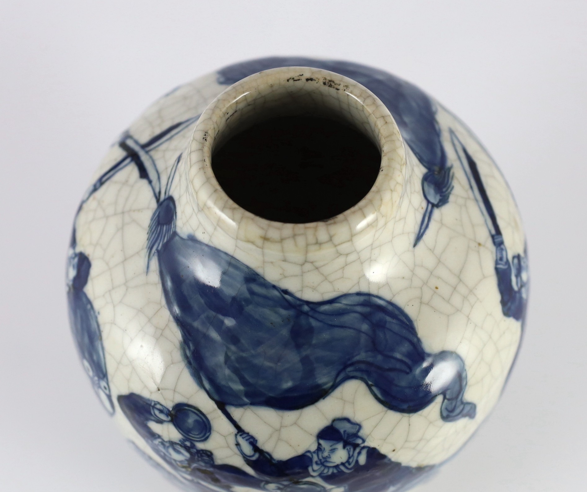 A Chinese blue and white crackle glaze ‘warriors’ vase, late 19th century, 35cm high, drilled hole